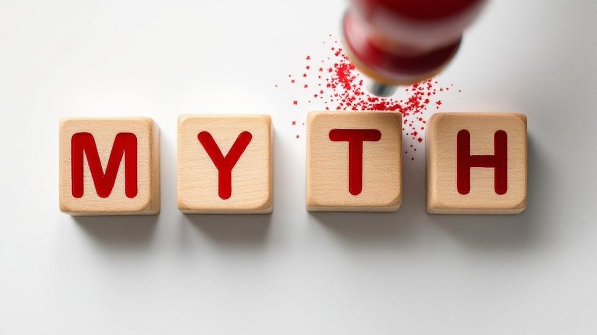 Wooden letter blocks with red rubber stamp — challenging common misconceptions